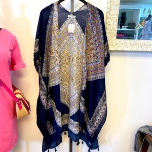 Kimono made by Woven Heart. One size fits all.